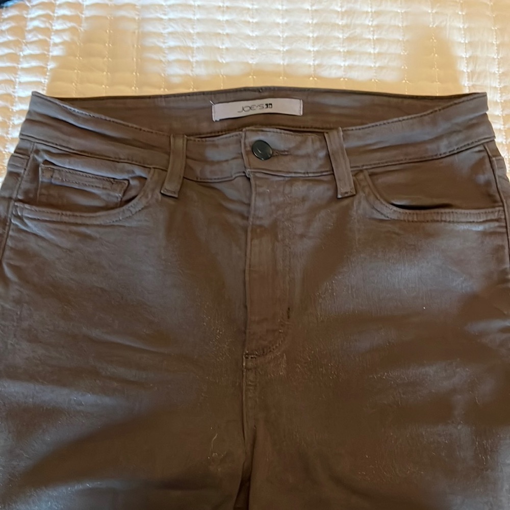 Joes stretch flare bottom brown jeans. Worn only a few times. Long length